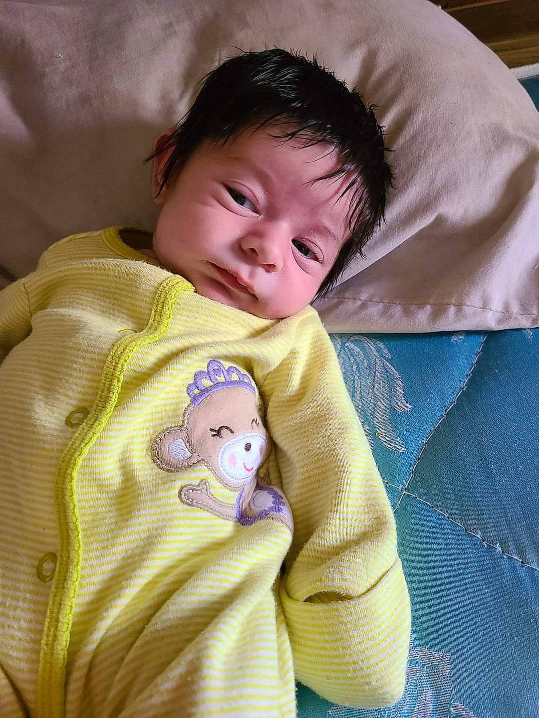 Victoria is registered to the contest to win money with this photo: baby, baby_products, baby_toddler_clothing, bedtime, cheek, child, comfort, eye, fur, gesture, happy, head, iris, linens, nose, person, sitting, skin, sleeve, textile