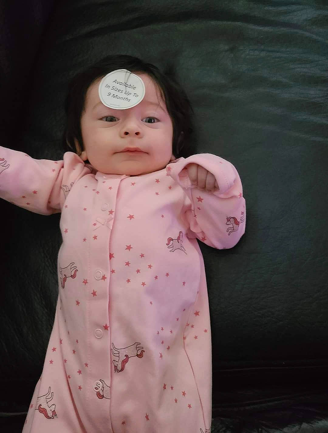 Victoria joined the competition — help win amazing prizes! arm, baby, baby_toddler_clothing, cheek, eye, facial_expression, finger, gesture, hand, head, headgear, human_body, lip, nose, outerwear, person, pink, product, skin, sleeve