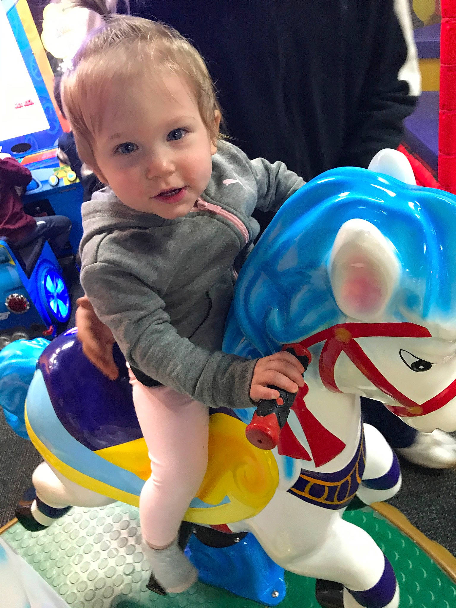 Sarena is registered to the contest to win money with this photo: baby, blue, cheek, child, costume, ear, eye, fictional_character, fun, games, head, person, play, sitting, skin, smile, snapshot, toddler, toy, vacation