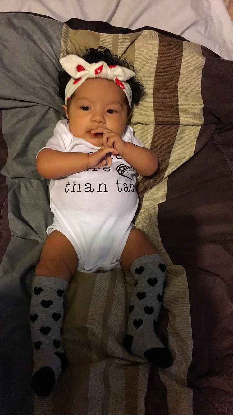 Selene is registered to the contest to win money with this photo: arm, baby, baby_toddler_clothing, child, headwear, human_leg, leg, person, product, thigh, toddler