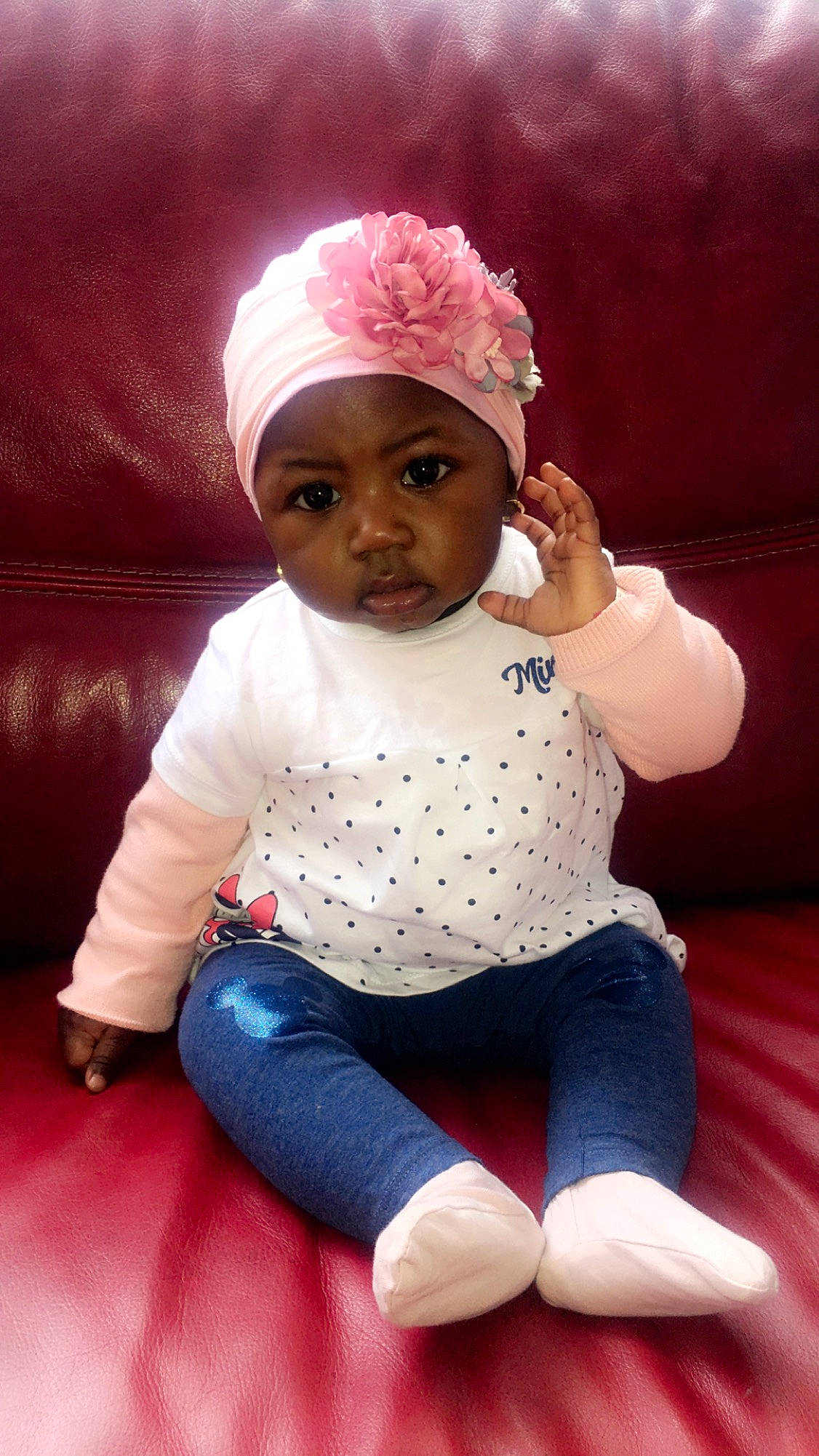 Mary participe au concours pour gagner de l'argent avec cette photo : baby, beanie, bonnet, cap, cheek, child, child_model, headgear, headwear, knit_cap, knitting, person, pink, sitting, skin, smile, toddler