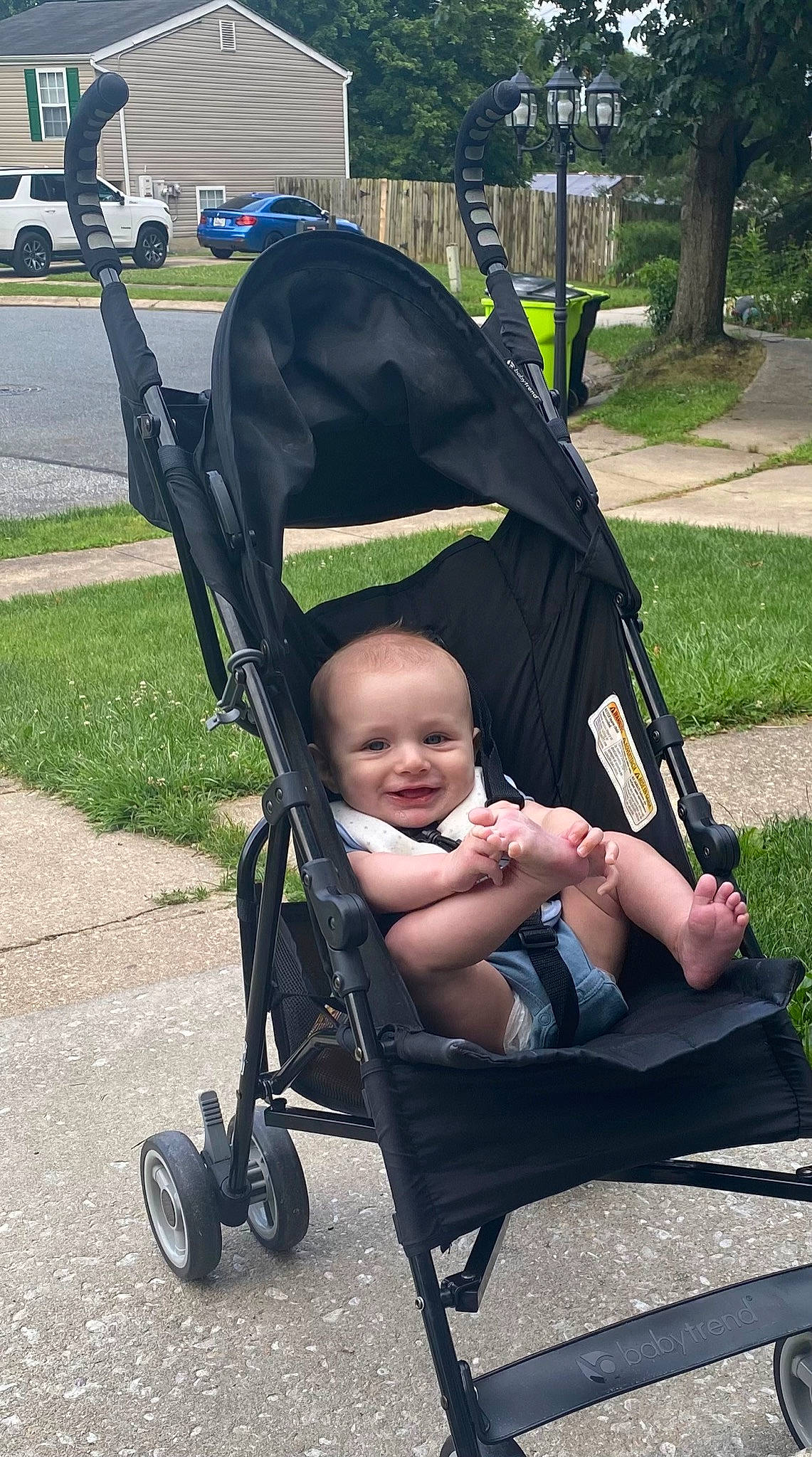 Lucas joined the competition — help win amazing prizes! auto_part, baby, baby_carriage, baby_products, baby_toddler_clothing, black, child, comfort, fun, grass, joy, person, photograph, plant, product, sitting, snapshot, tire, toddler, tree