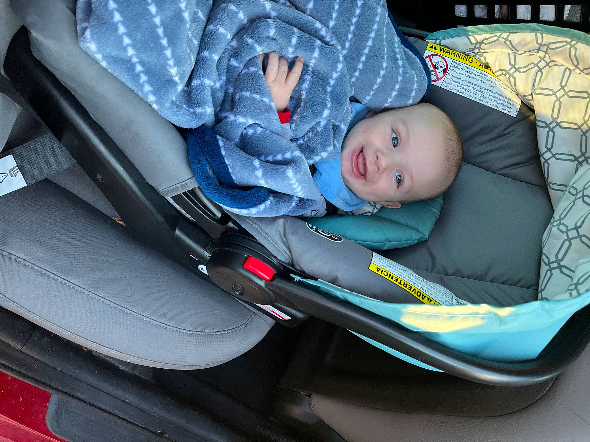 Lucas is registered to the contest to win money with this photo: auto_part, automotive_design, automotive_exterior, baby, baby_carriage, baby_products, baby_safety, baby_toddler_clothing, car_seat, child, comfort, family_car, infant_bed, lap, person, personal_luxury_car, sitting, smile, toddler, vehicle_door