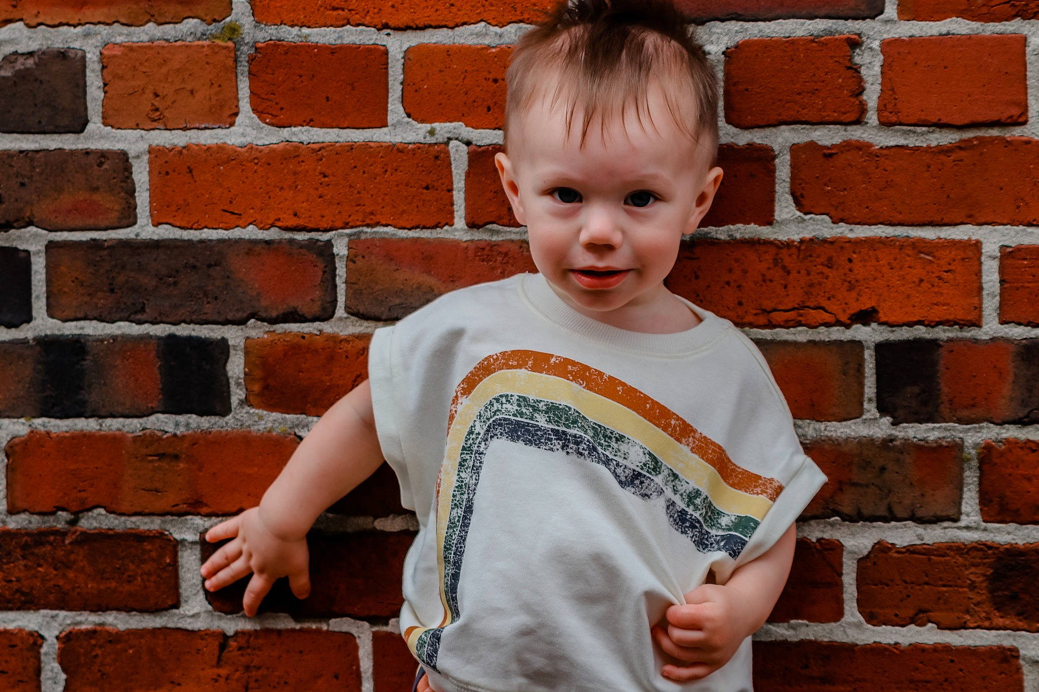 Maverick joined the competition — help win amazing prizes! baby_toddler_clothing, brick, brickwork, child, face, flash_photography, flooring, fun, happy, head, long_sleeved_t_shirt, orange, pattern, person, red, sitting, sleeve, standing, t_shirt, toddler