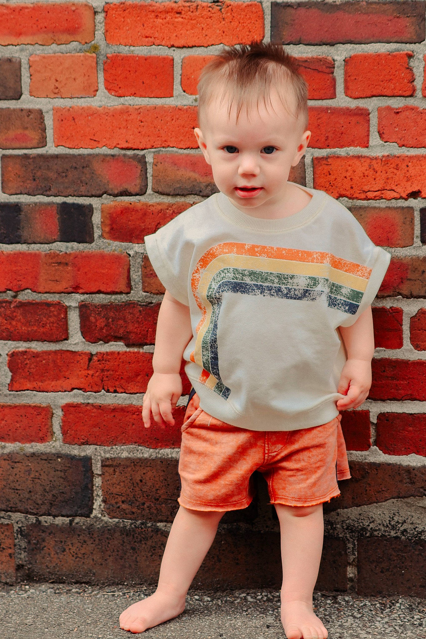 Maverick joined the competition — help win amazing prizes! baby_toddler_clothing, brick, brickwork, chin, dress, hair, hairstyle, happy, joint, neck, orange, pattern, person, pink, red, shorts, shoulder, sleeve, t_shirt, toddler