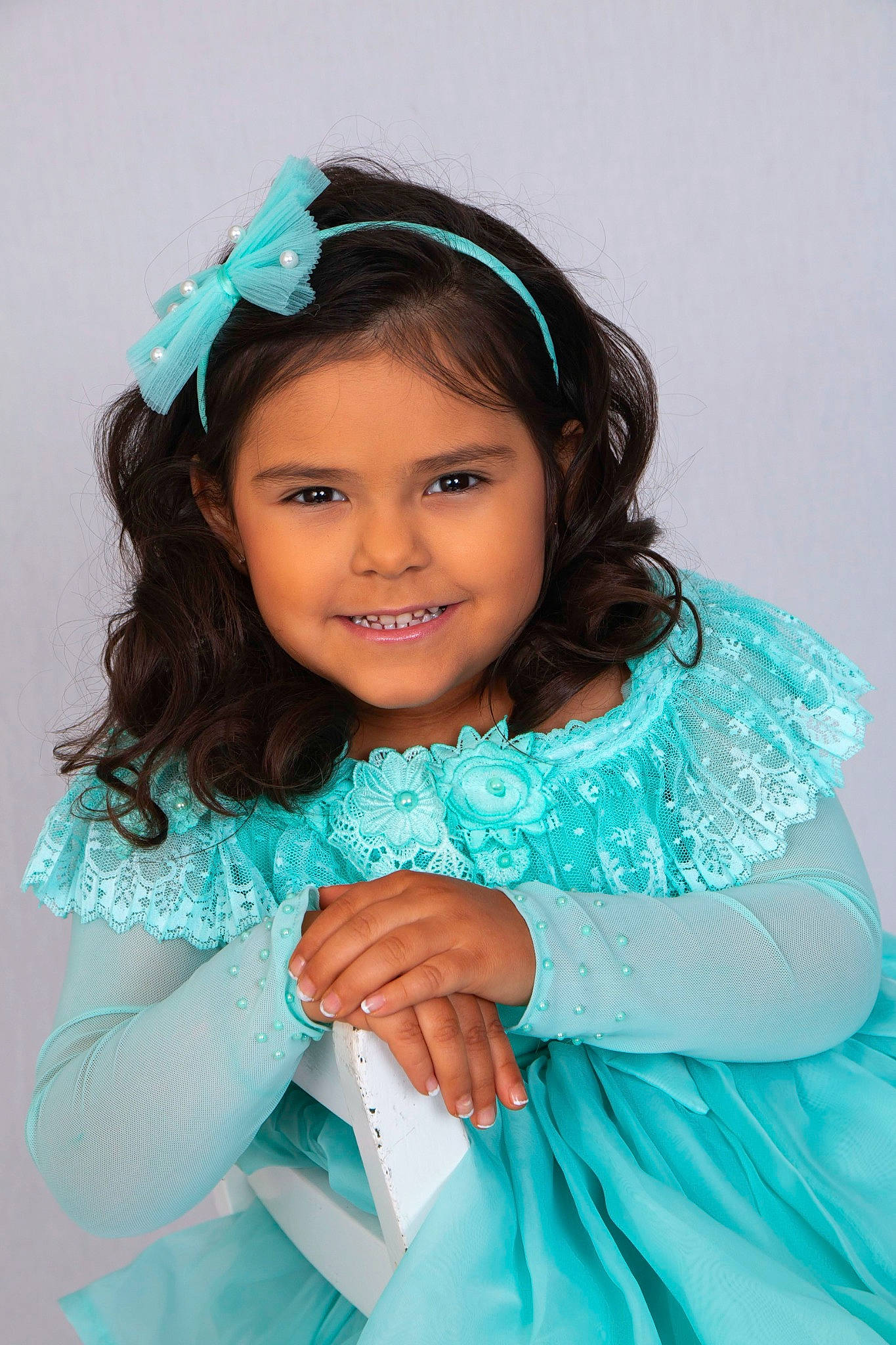 Mackenna is registered to the contest to win money with this photo: arm, blue, chin, dress, eye, eyebrow, face, facial_expression, flash_photography, hair, hairstyle, hand, happy, head, iris, joy, person, purple, shoulder, skin