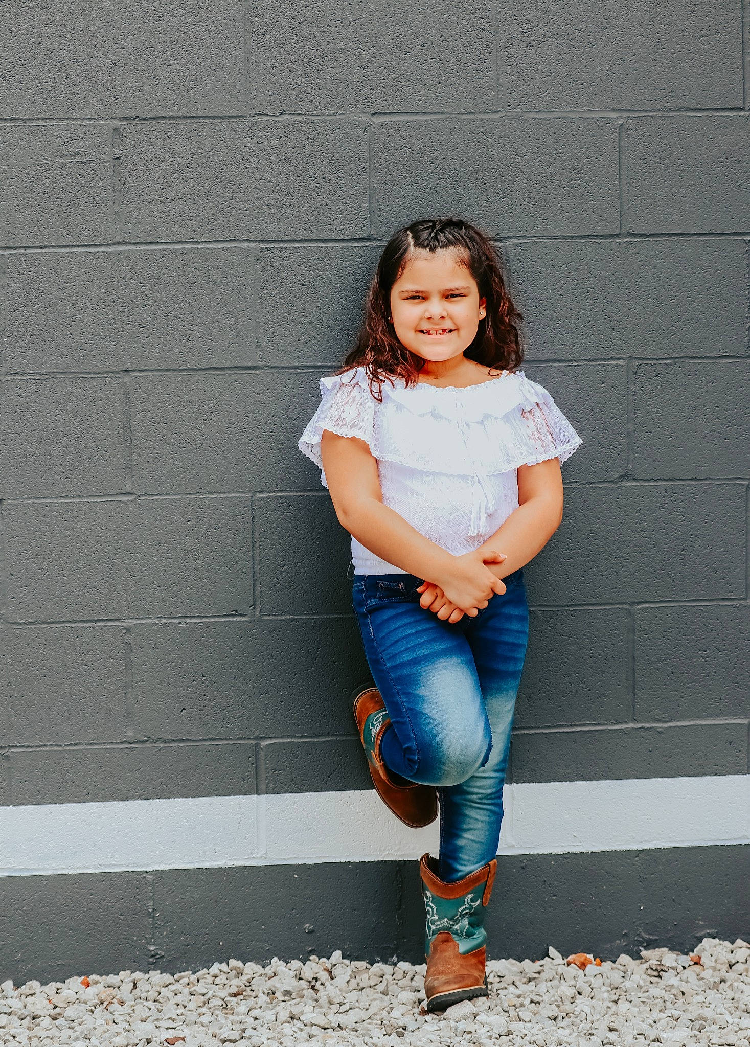 Mackenna is registered to the contest to win money with this photo: blond, brown_hair, denim, electric_blue, fashion_design, flash_photography, foot, grey, happy, human_leg, joy, knee, leg, long_hair, pattern, person, sitting, sleeve, smile, t_shirt