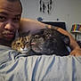 Miku is registered to the contest to win money with this photo: man, cat, dog, bed, blanket, lamp, dreamcatcher, tattoo, indoor, snuggling, pet, animal, cozy, portrait, face, expression, furniture, home, comfort, playful