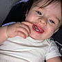 Hayden participe au concours pour gagner de l'argent avec cette photo : baby, child, person, smile, happy, face, hand, glasses, adult, indoor, white_clothing, closeup, portrait, candid, joy, playful, infant, skin, mouth, hair