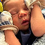 Jasmere joined the competition — help win amazing prizes! baby, sleeping, mittens, blanket, closeup, face, infant, peaceful, soft_lighting, cozy, clothing, nike_logo, newborn, portrait, skin, resting, cute, young_child, warm, toddler