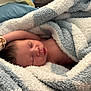 Jasmere is registered to the contest to win money with this photo: newborn, baby, sleeping, blanket, soft_texture, striped_blanket, mitten, infant, peaceful, closeup, rest, cozy, skin, face, head, child, portrait, bed, warm, comfort