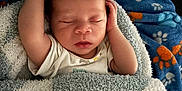 Jasmere joined the competition — help win amazing prizes! baby, newborn, sleeping, blanket, arm, hand, face, infant, cozy, paw_print, fabric, soft_texture, wrapped, peaceful, closeup, child, person, bedtime, cute, resting