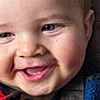 Lucien participe au concours pour gagner de l'argent avec cette photo : baby, close_up, smile, face, blue_eyes, cheeks, teeth, child, joyful, cute, infant, clothing, portrait, skin, mouth, happy, expression, person, young, head