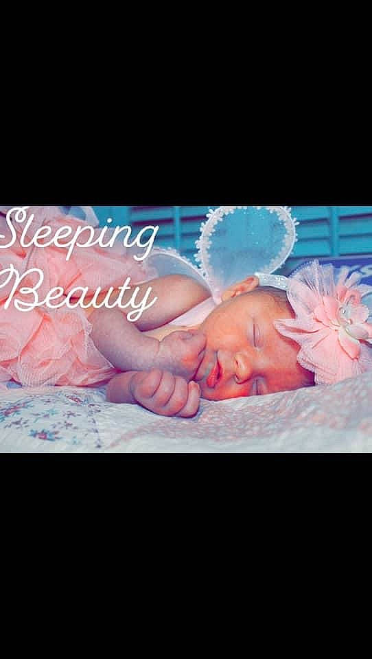 Karleigh is registered to the contest to win money with this photo: baby, child, flesh, font, hand, headwear, person, photo_caption, photography, pink, text, turquoise