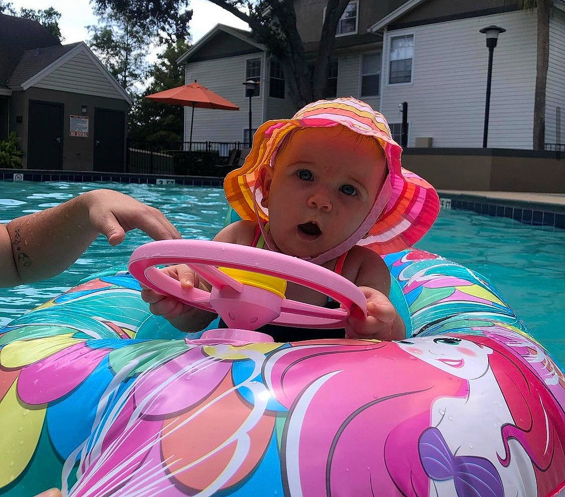 Eleanor joined the competition — help win amazing prizes! baby, baby_float, baby_products, boats_and_boating_equipment_and_supplies, child, fun, games, headwear, inflatable, leisure, magenta, person, personal_protective_equipment, pink, recreation, red, surprise, swimming_pool, swimwear, toddler
