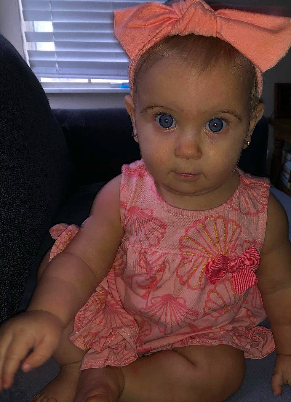 Eleanor is registered to the contest to win money with this photo: cheek, chin, eye, eyebrow, facial_expression, forehead, hairstyle, hand, head, human_body, iris, lip, mouth, neck, nose, organ, person, skin, standing, window