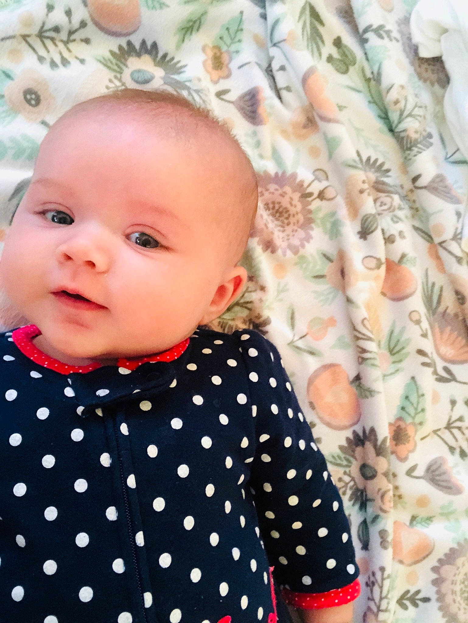 Maryjane joined the competition — help win amazing prizes! baby, baby_products, baby_toddler_clothing, cheek, child, design, head, outerwear, pattern, person, pink, polka_dot, product, skin, sleeve, textile, toddler