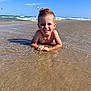 child, boy, smiling, beach, water, ocean, sand, sunny, sky, waves, summer, fun, outdoor, happy, kitesurfing, play, nature, vacation, holiday, relaxation