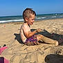 Giovanni a rejoint le concours — aidez-le/la à gagner de superbes lots ! child, boy, beach, sand, sea, ocean, sunny, summer, swim_trunks, water, waves, playing, happy, outdoor, nature, vacation, shore, daytime, barefoot, smiling