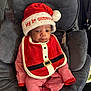 Jeremy is registered to the contest to win money with this photo: adorable, baby, car_seat, christmas_hat, cute, festive, holiday, holly_jolly, infant, looking_up, newborn, plush_cushion, portrait, red_clothing, santa_bib, seat_strap, soft_texture, striped_pajamas, white_trim, wide_eyes