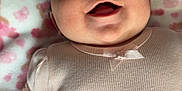 Kailaia joined the competition — help win amazing prizes! baby, infant, smiling, pink_clothing, ponytail, blanket, teddy_bear_pattern, cute, happy, portrait, child, soft_toys, lying_down, closeup, adorable, young_child, face, head, tutu, fabric