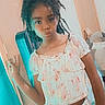 child, girl, pose, peace_sign, pout, floral, outfit, dress, indoor, room, door, chair, curtain, basket, hair, braids, emojis, black_hearts, casual, portrait