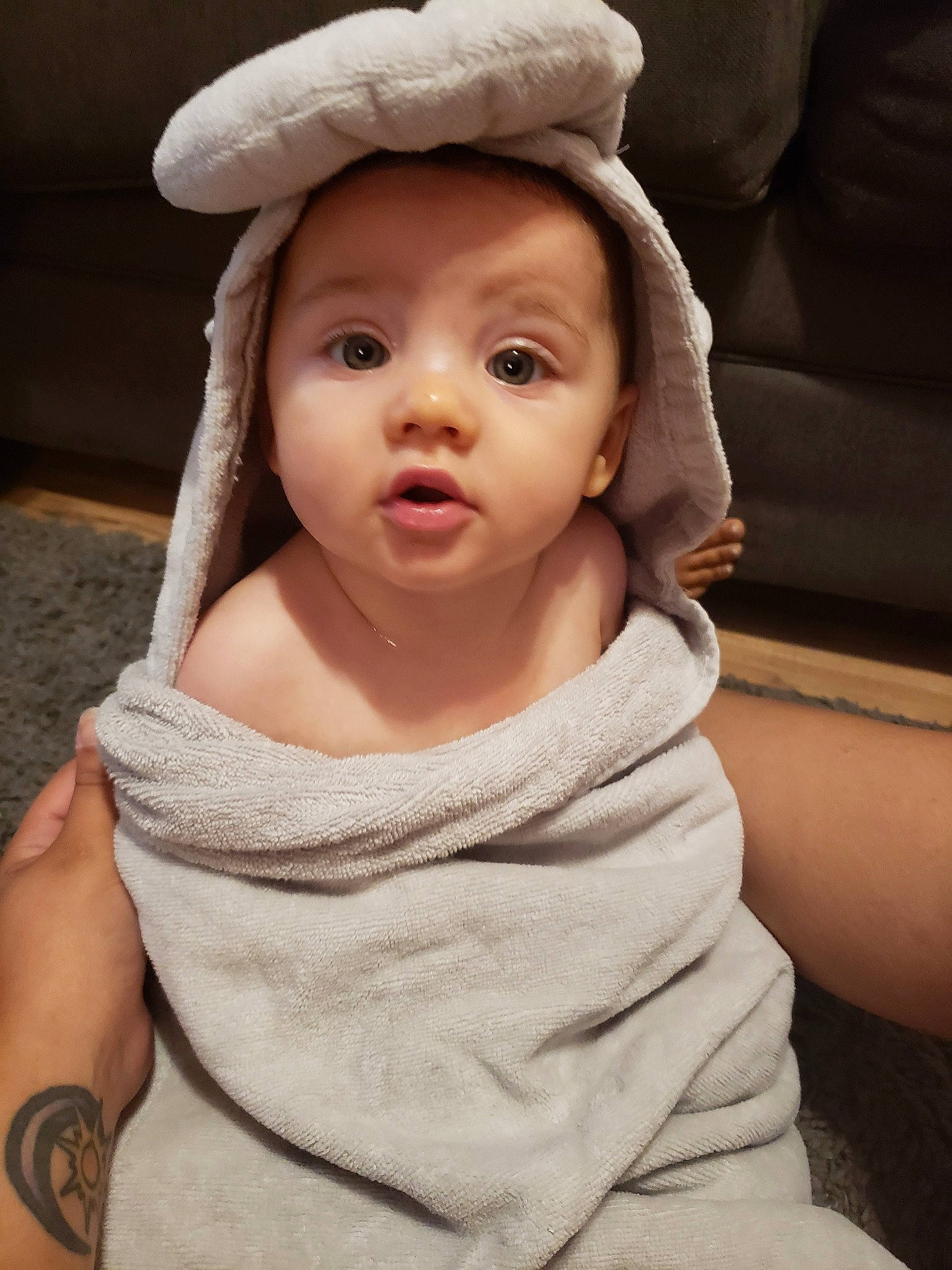 Kylar joined the competition — help win amazing prizes! baby, cheek, child, chin, ear, eye, face, hat, head, headgear, linens, lip, nose, person, skin, smile, surprise, toddler, towel