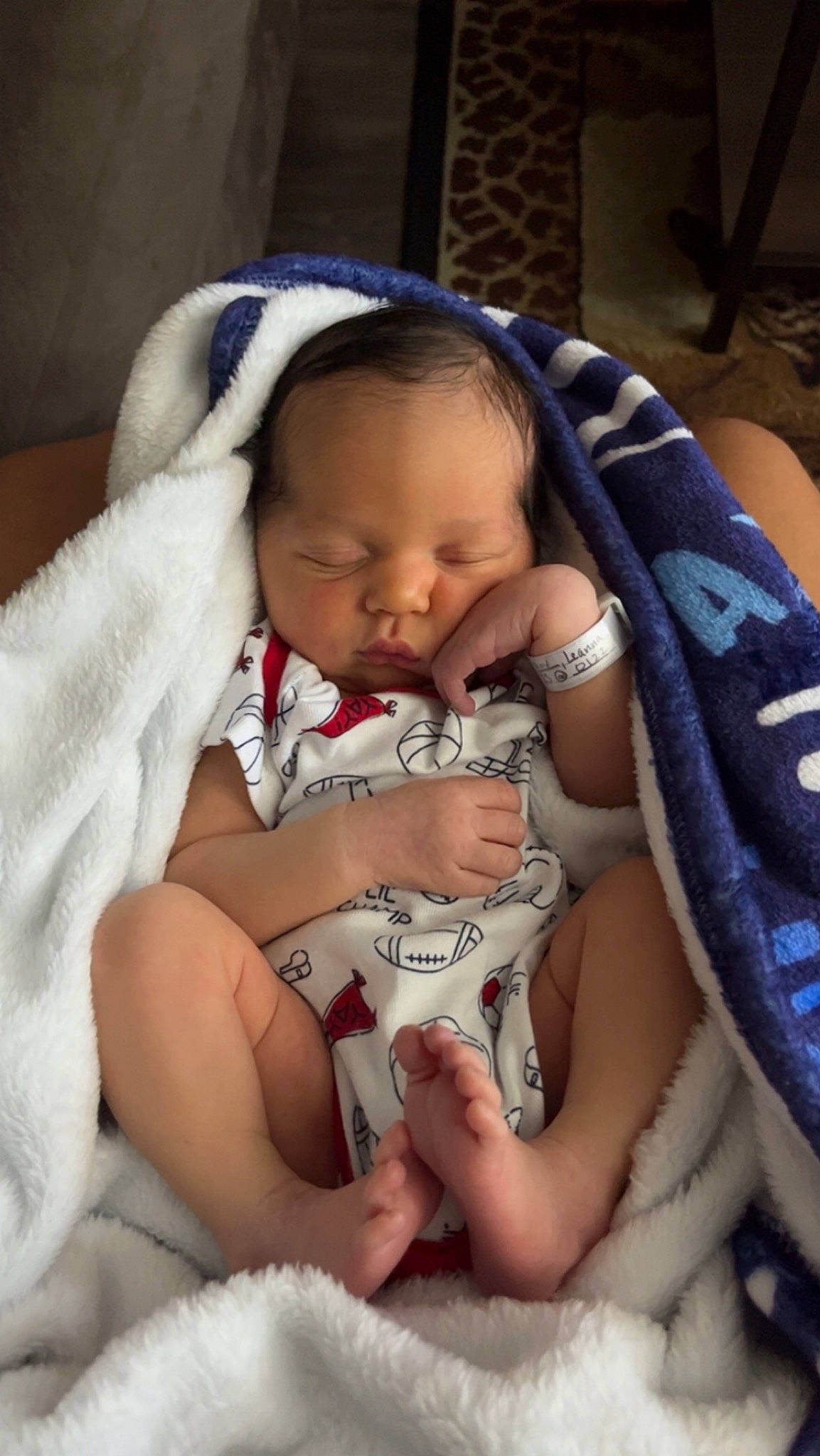 Aziah joined the competition — help win amazing prizes! abdomen, baby, baby_products, baby_sleeping, baby_toddler_clothing, chair, cheek, child, comfort, event, finger, gesture, hair, happy, linens, nail, person, sitting, skin, thumb