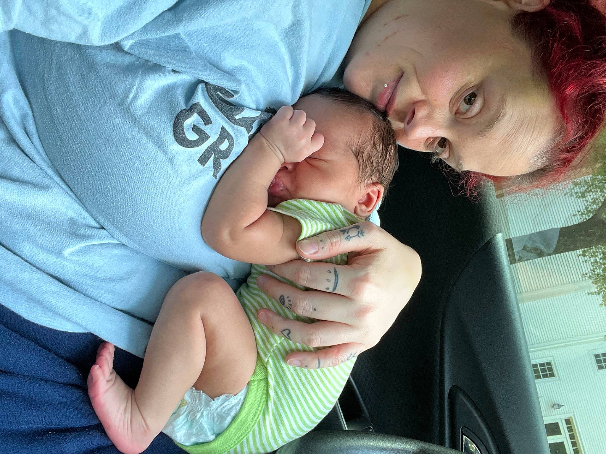 Aziah is registered to the contest to win money with this photo: arm, baby, baby_products, baby_toddler_clothing, cheek, child, comfort, elbow, finger, gesture, grass, hand, happy, joy, mouth, nail, person, skin, smile, thumb