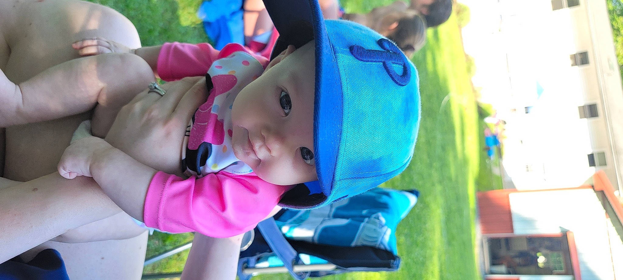 Theresa joined the competition — help win amazing prizes! baby, baby_products, cap, child, electric_blue, event, fun, grass, happy, hat, headgear, headwear, leisure, magenta, person, plant, play, purple, recreation, sun_hat