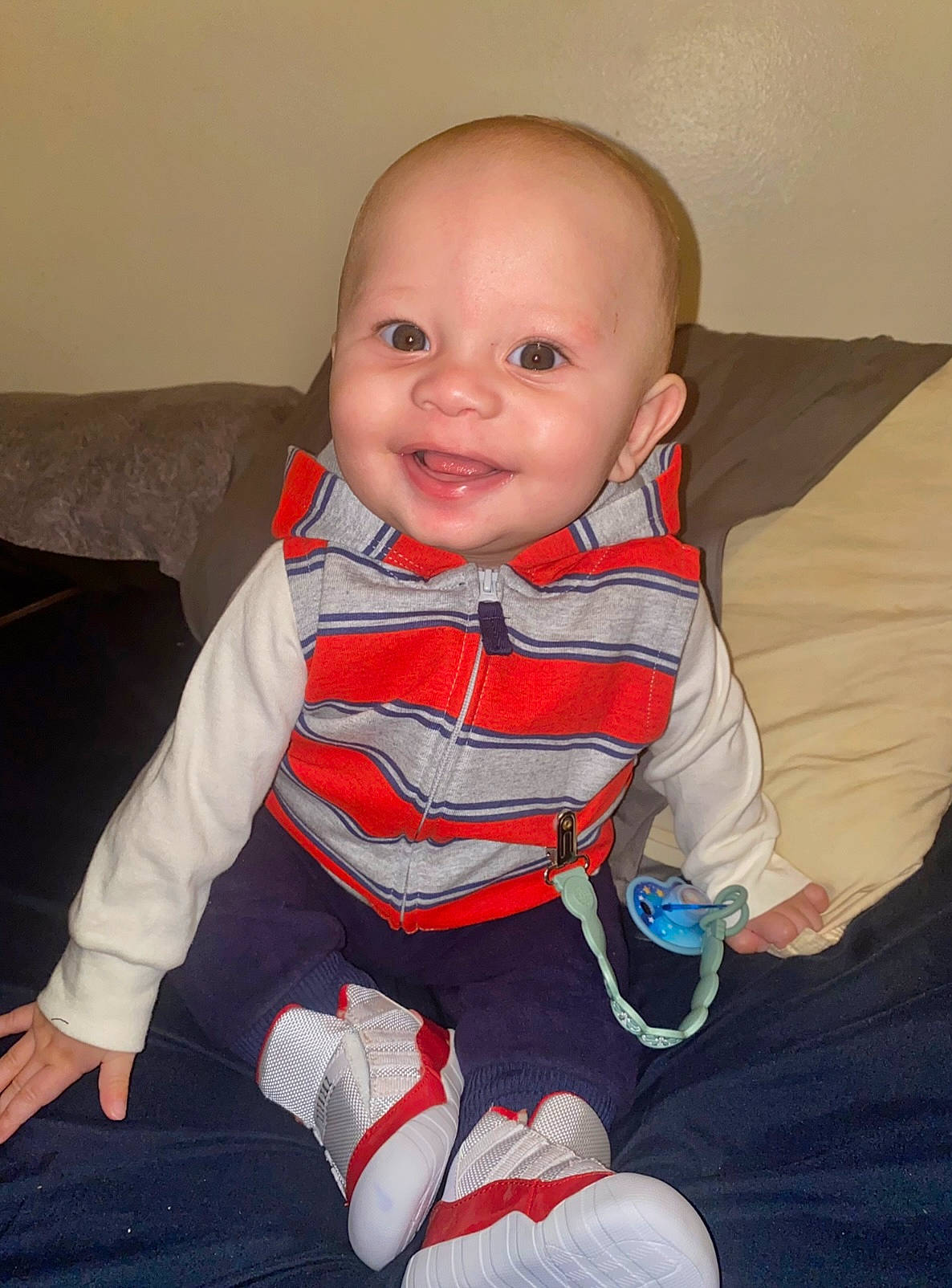 Kyrie joined the competition — help win amazing prizes! baby, baby_toddler_clothing, cheek, chin, comfort, couch, eye, finger, fun, happy, iris, joy, knee, lap, nose, person, sitting, sleeve, smile, textile