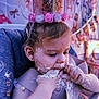 Aurora is registered to the contest to win money with this photo: baby, child, birthday, cake, crown, messy, face_paint, high_chair, hand, party, celebration, pink, white, frosting, fun, cute, food, young_child, indoor, smearing