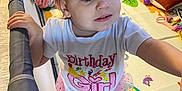 Aurora joined the competition — help win amazing prizes! toddler, child, birthday_girl, playpen, pink_tutu, white_tshirt, hair_clip, toys, pillow, laundry_basket, indoor, floor_mat, smiling, curious, baby, cute, clothing, young_child, play_area, person
