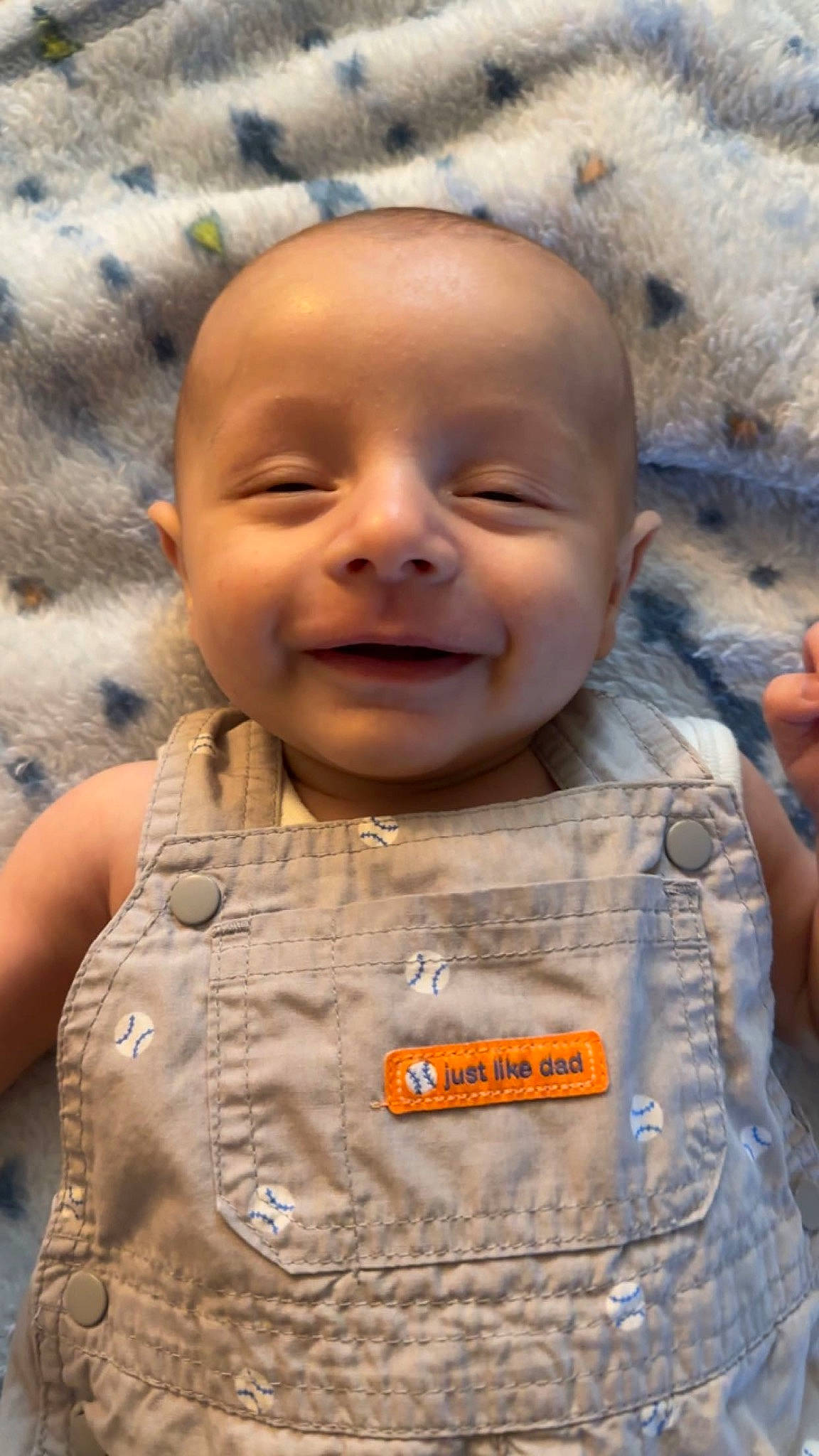 Korbyn is registered to the contest to win money with this photo: baby, baby_toddler_clothing, cheek, chin, eye, face, facial_expression, gesture, happy, head, human, iris, joy, leaf, lip, mouth, nose, organ, person, skin