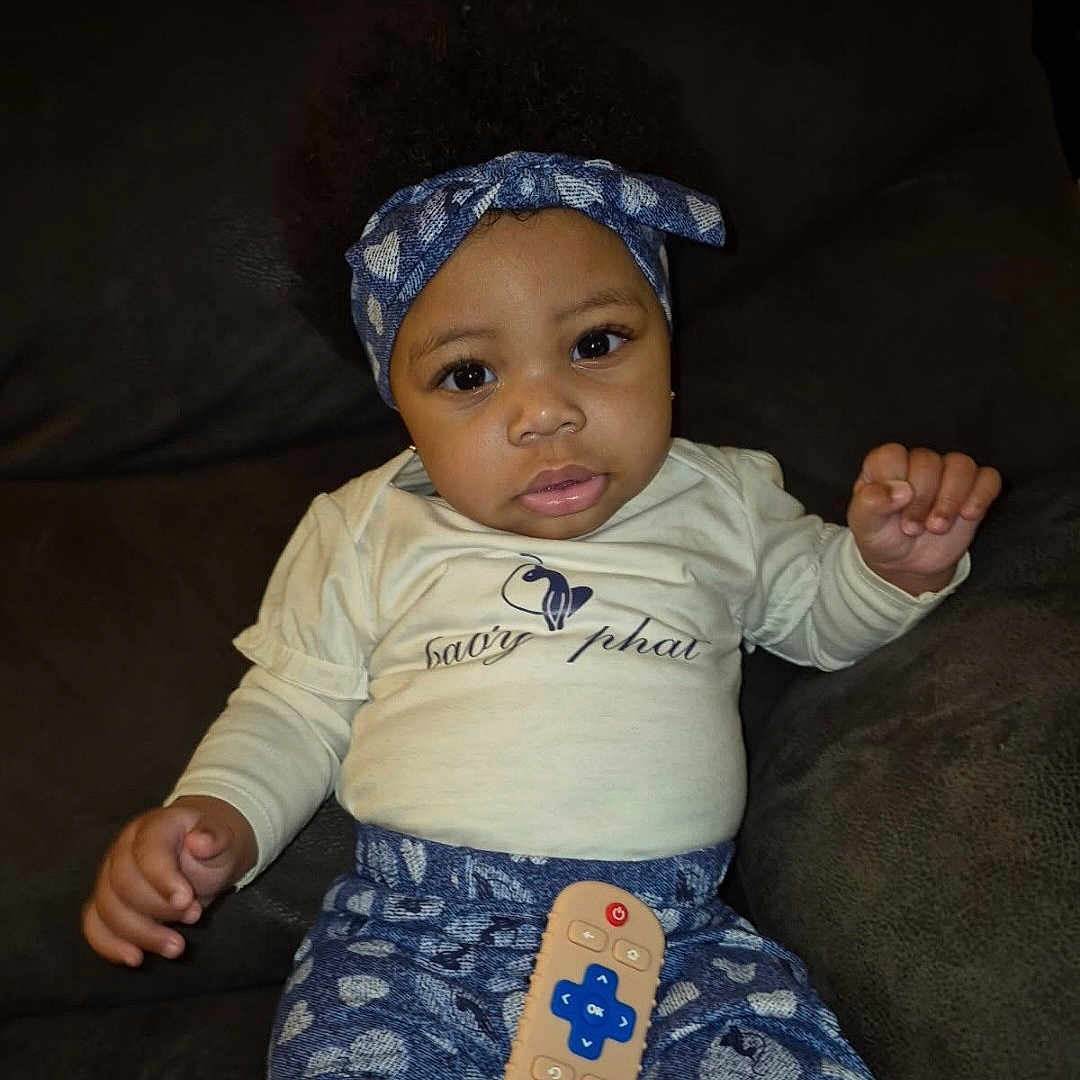 Ahmazen joined the competition — help win amazing prizes! accessories, baby, bodypart, clothing, couch, cushion, face, finger, furniture, hand, happy, head, headband, homedecor, pants, person, photography, portrait, sitting, t_shirt