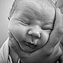 Roman is registered to the contest to win money with this photo: baby, newborn, infant, black_and_white, close_up, face, hand, sleeping, peaceful, portrait, emotion, skin, person, love, tenderness, soft, cute, newborn_clothing, emoji, blue_heart