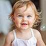 child, toddler, smile, blue_eyes, blonde_hair, white_top, portrait, face, happy, bubbles, indoor, soft_lighting, closeup, cute, baby, skin, person, young_child, innocence, joy