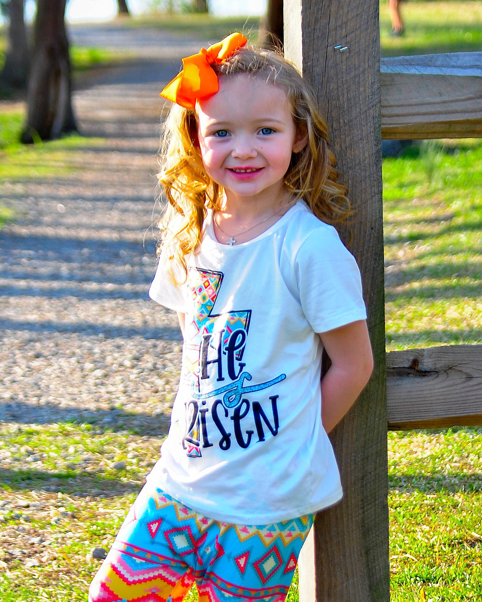 Rilynn is registered to the contest to win money with this photo: eye, face, grass, green, hair, happy, head, iris, joy, leaf, leisure, people_in_nature, person, photograph, plant, sleeve, smile, street_fashion, summer, t_shirt
