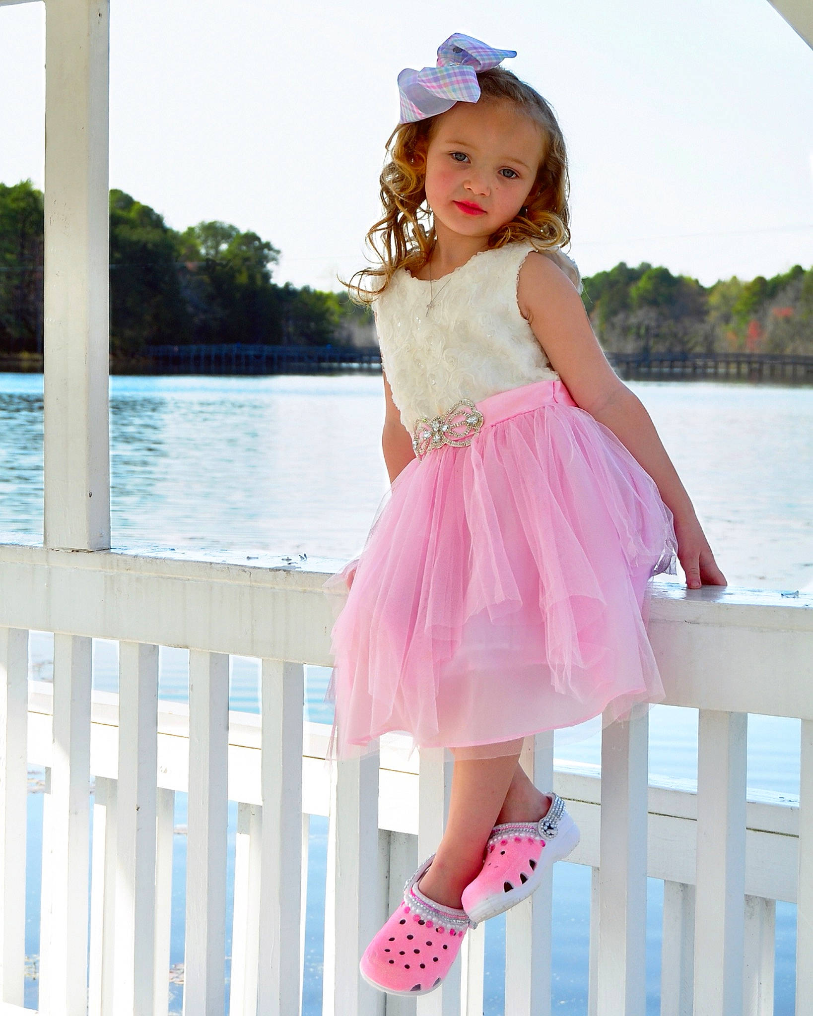 Rilynn is registered to the contest to win money with this photo: azure, day_dress, dress, facial_expression, hairstyle, happy, hat, person, pink, shoulder, skin, sky, sleeve, smile, street_fashion, sun_hat, thigh, toddler, waist, water