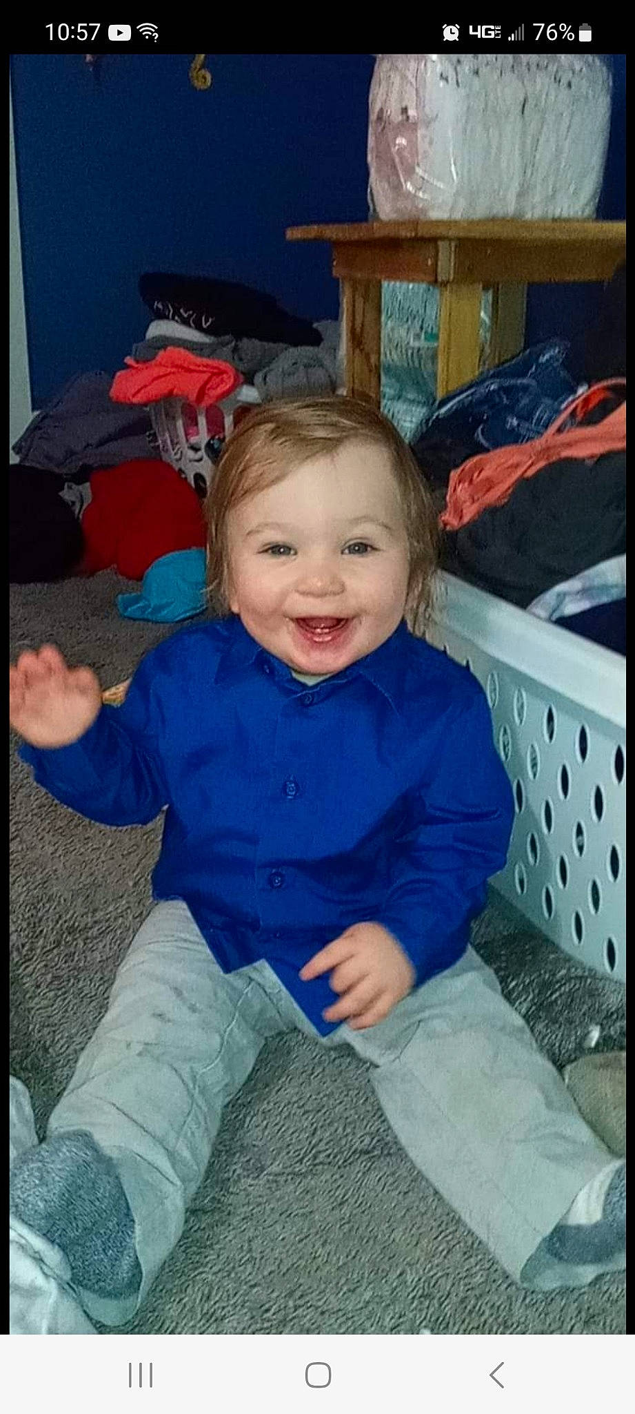 Jaxon is registered to the contest to win money with this photo: baby_toddler_clothing, blue, cheek, child, comfort, electric_blue, fun, gesture, happy, iris, joy, lap, laugh, mouth, person, sitting, sleeve, smile, standing, t_shirt