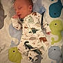 baby, bedtime, child, clothing, crib, cute, dinosaur, indoors, infant, newborn, onesie, pacifier, peaceful, person, quilt, rest, sleeping, soft, toddler, whale