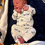 Daniel joined the competition — help win amazing prizes! baby, baby_garment, blanket, child, clothing, cozy, cute, face, foot, hand, indoor, infant, lying_down, newborn, pajamas, patterned_clothing, peaceful, rest, sleeping, soft