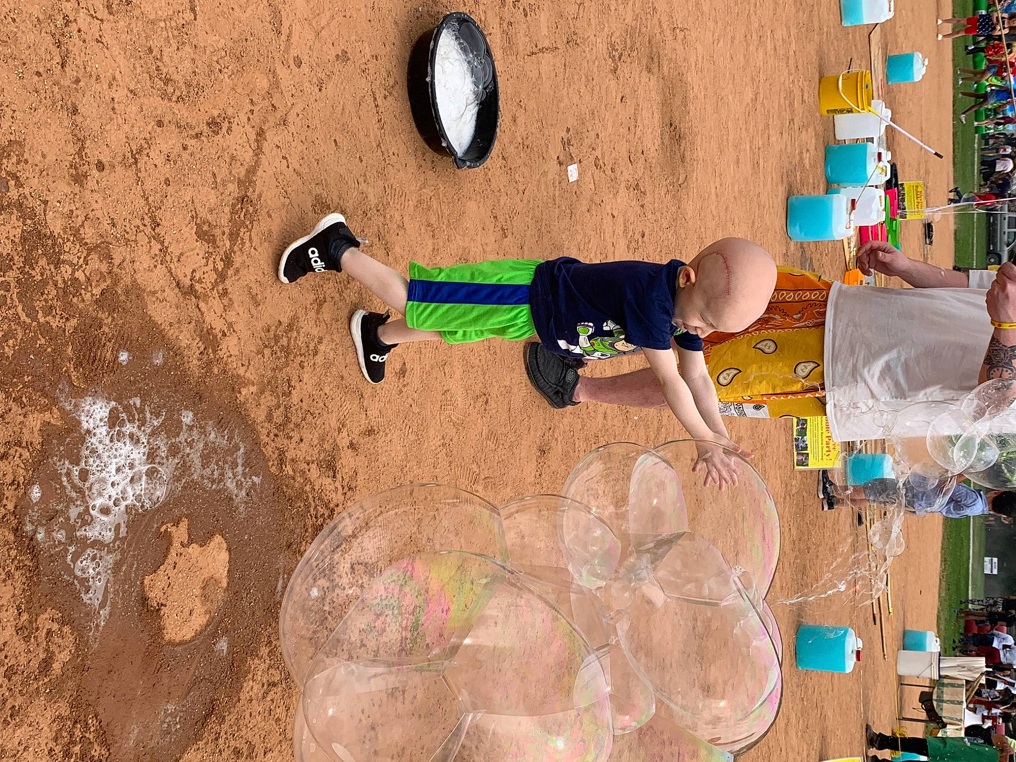 Jaxen is registered to the contest to win money with this photo: adventure, art, brick, child, fun, happy, hat, leisure, person, play, recreation, shadow, shorts, soil, t_shirt, toddler, tree, visual_arts, walking_shoe, wall