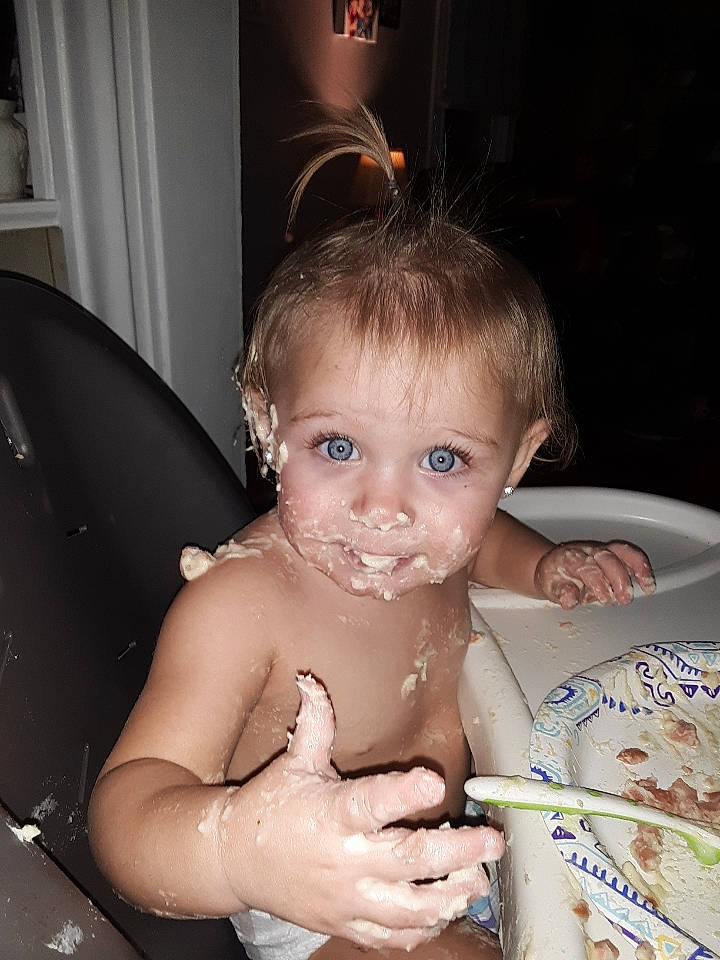 Eva is registered to the contest to win money with this photo: baby, baby_bathing, baby_food, bathing, child, comfort_food, eating, eye, face, joy, person, sitting, skin, smile, toddler