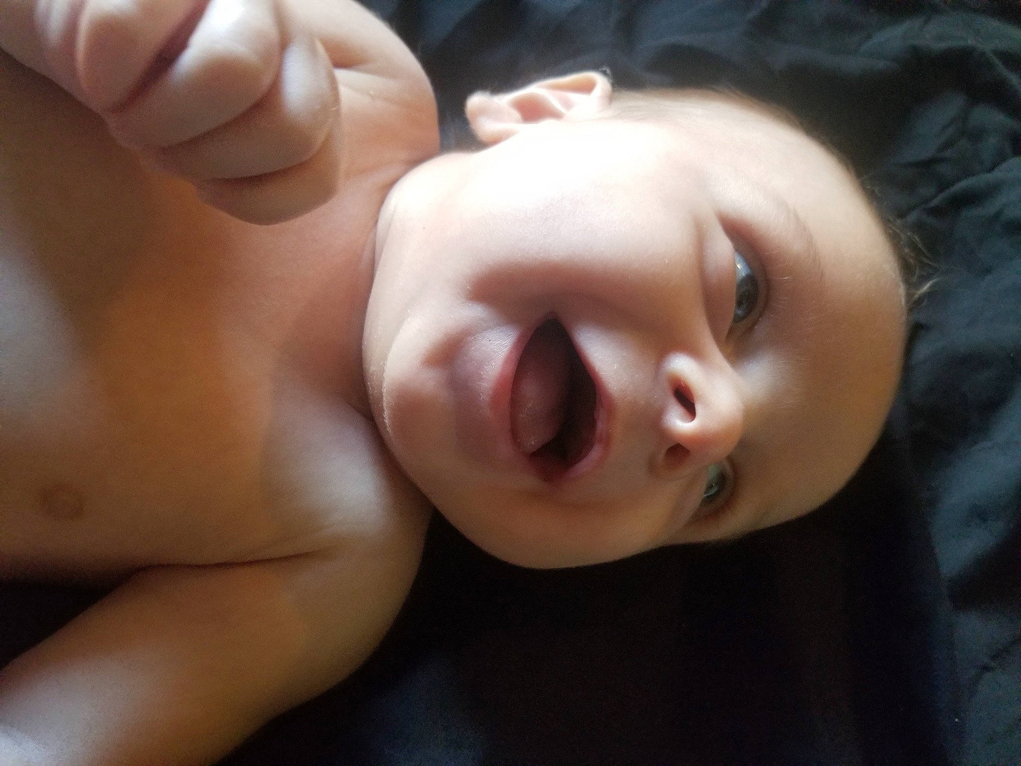 Rhett is registered to the contest to win money with this photo: baby, beauty, black_hair, cheek, child, chin, close_up, eye, eyebrow, face, finger, forehead, hand, head, lip, mouth, muscle, neck, nose, person