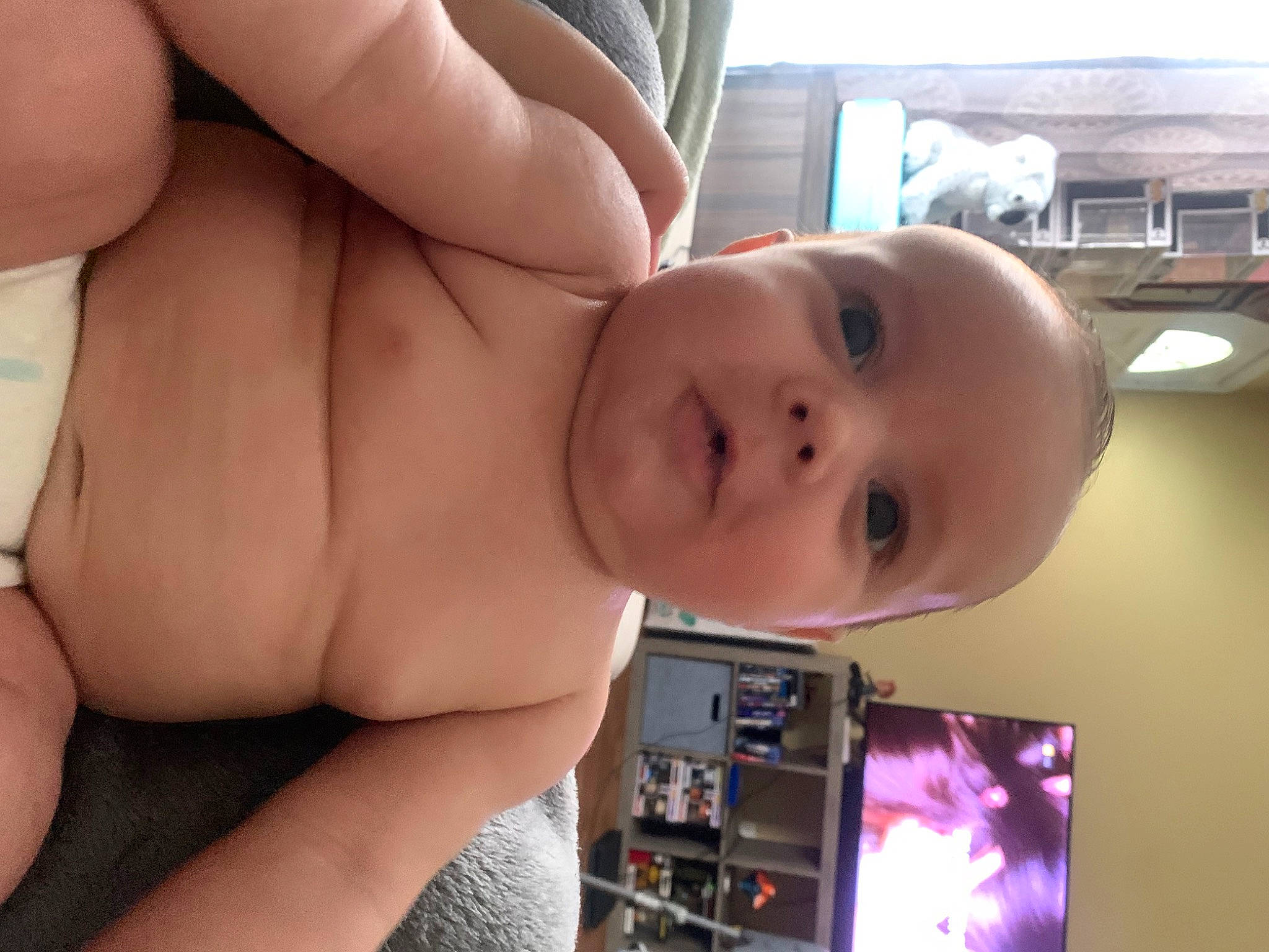 Kyro is registered to the contest to win money with this photo: baby, cheek, chest, elbow, eye, eyebrow, eyelash, fun, gesture, head, leg, lip, mouth, muscle, nose, person, skin, smile, thumb, toddler