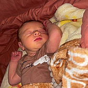 Nash is registered to the contest to win money with this photo: baby, sleeping, blanket, cozy, newborn, infant, child, soft, warm, clothing, face, resting, comfort, indoor, cute, peaceful, wrapped, portrait, relaxation, bed