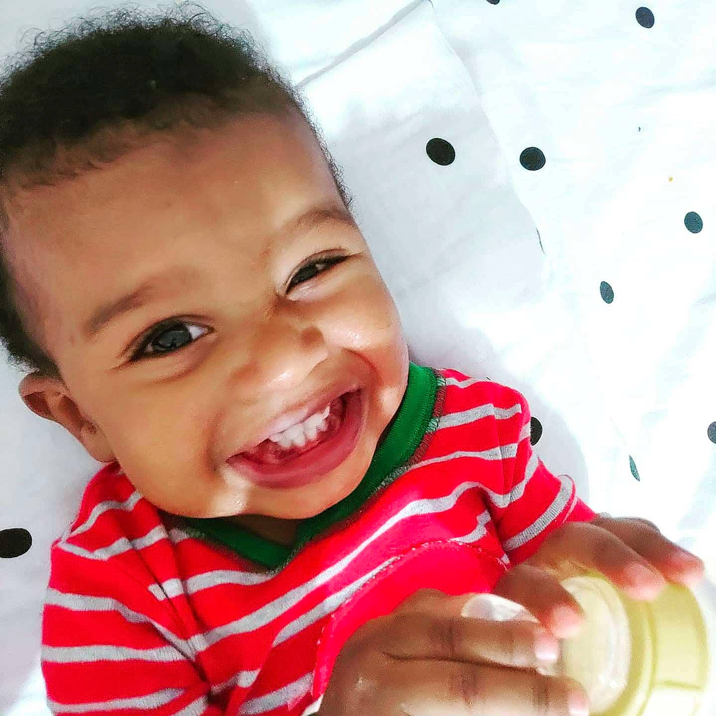 Dennis is registered to the contest to win money with this photo: baby, cheek, child, chin, face, facial_expression, fun, gesture, happy, head, joy, laugh, lip, mouth, nose, person, skin, smile, toddler, tooth