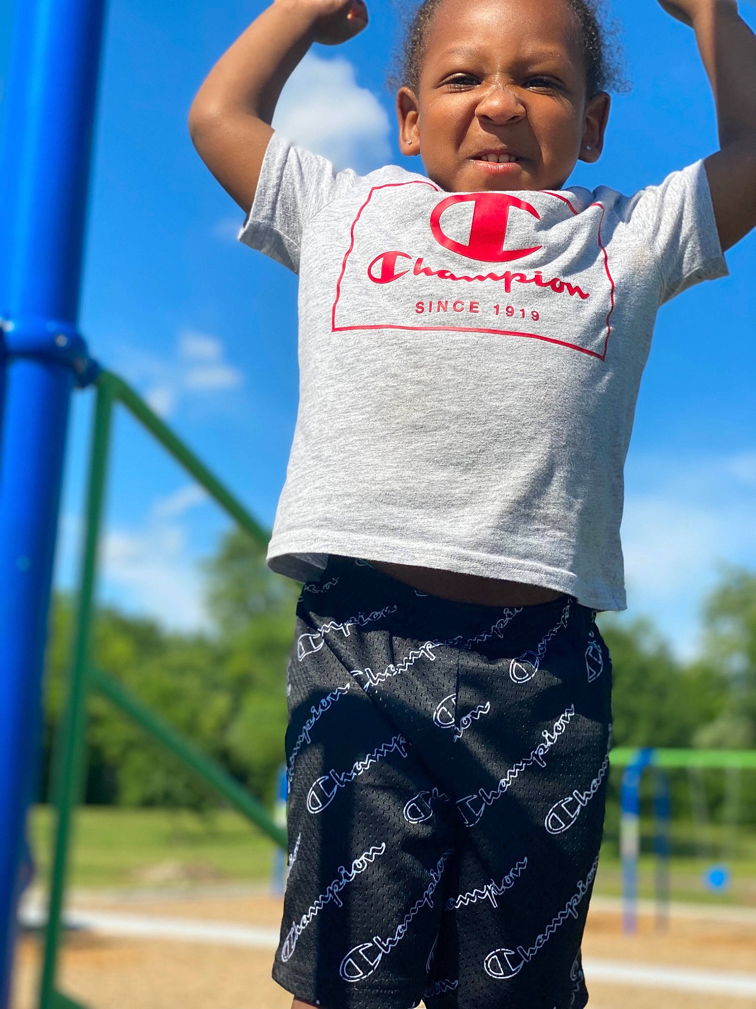 Maddux joined the competition — help win amazing prizes! black, blue, daytime, fun, gesture, grass, green, happy, leisure, light, people, people_in_nature, person, photograph, sky, sleeve, summer, t_shirt, toddler, white