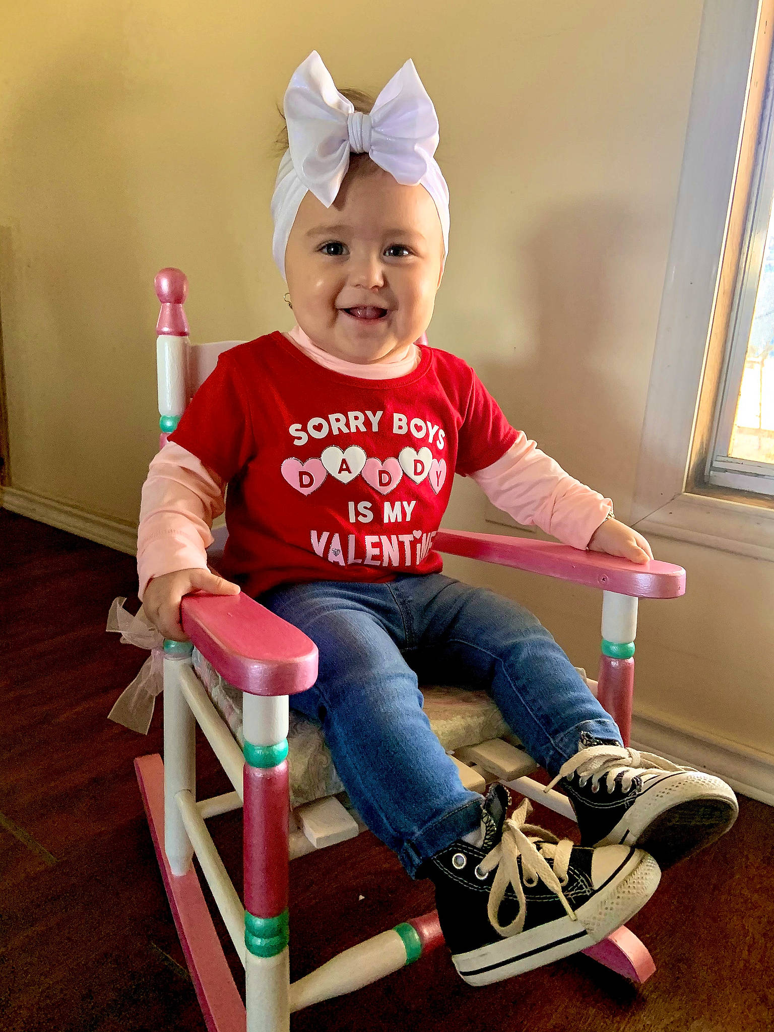 Juliet joined the competition — help win amazing prizes! baby, baby_toddler_clothing, child, happy, headwear, human_body, jeans, joy, knee, leg, person, picture_frame, pink, shorts, sleeve, smile, sneakers, sock, t_shirt, thigh